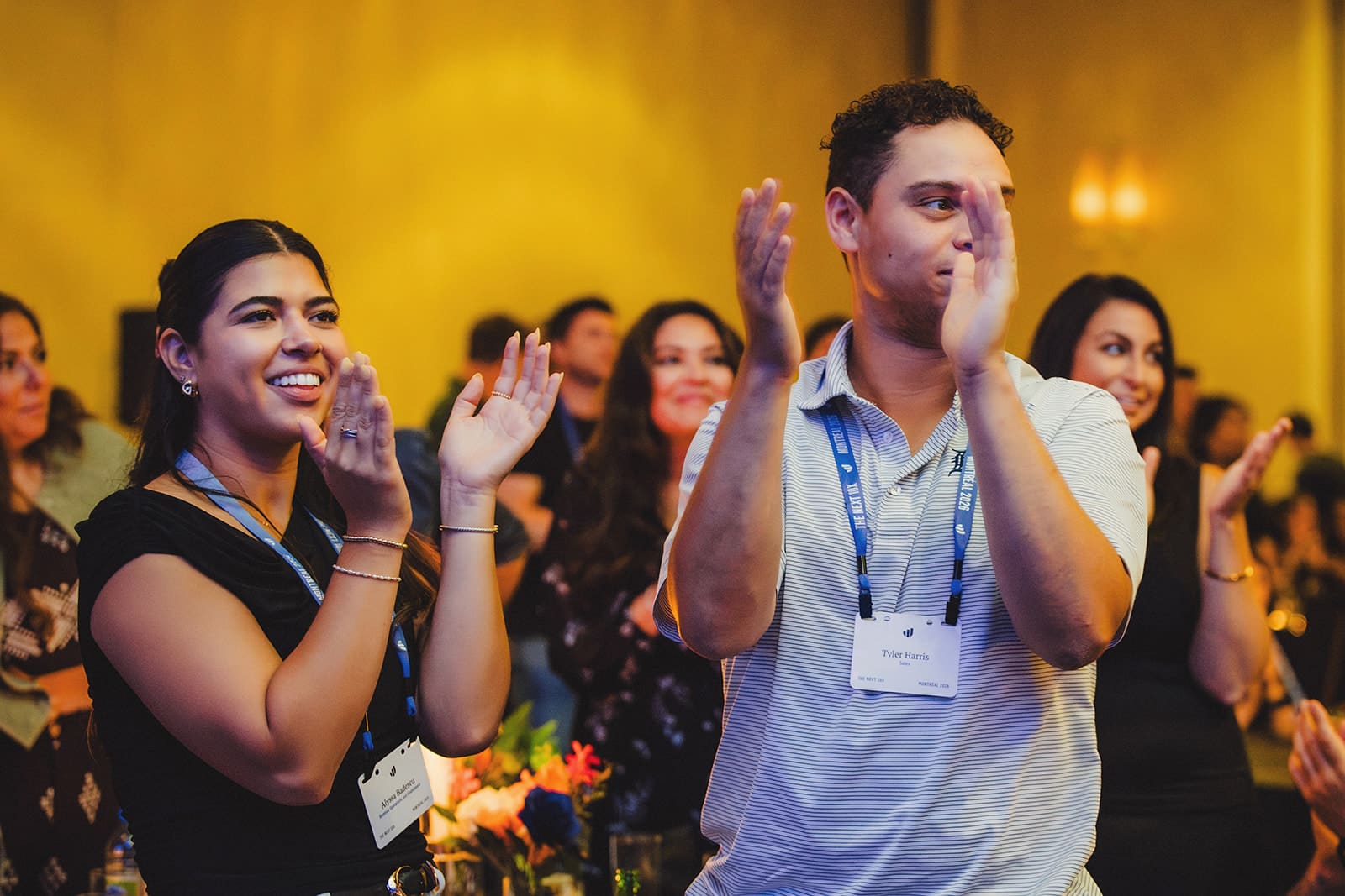 EvenUp guests on their feet applauding at the end of the mentalism show